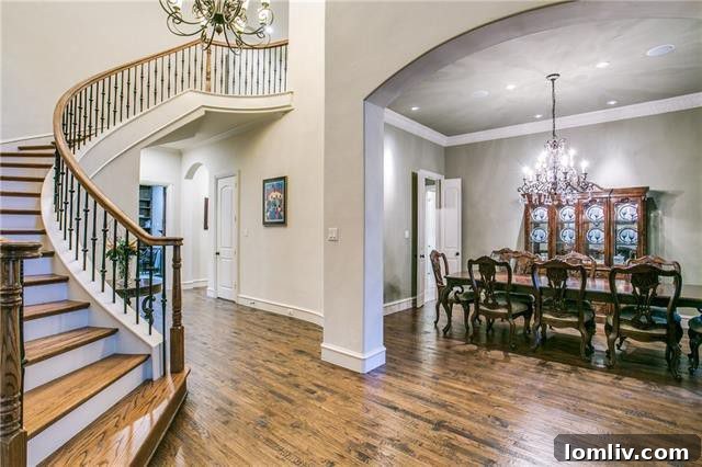 Elegant living room with hand-scraped hardwood floors at 6731 Brookshire Drive