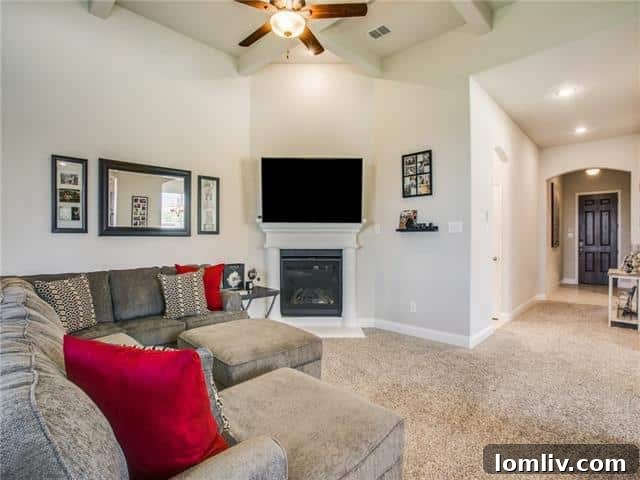 Spacious Living Room with Fireplace in Rockwall Downes Home