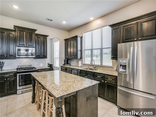 Modern Chef's Kitchen with Island and Granite Countertops