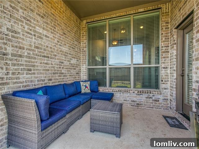 Covered Patio and Backyard of Rockwall Downes Property