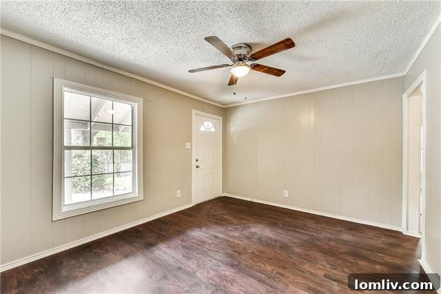 Spacious living area with modern flooring
