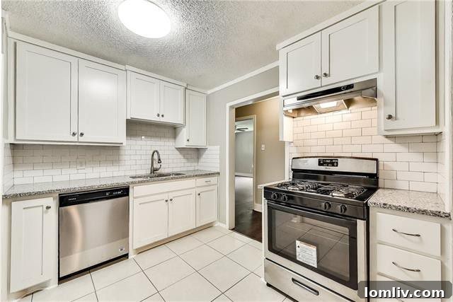 Modern kitchen with granite countertops and stainless steel appliances