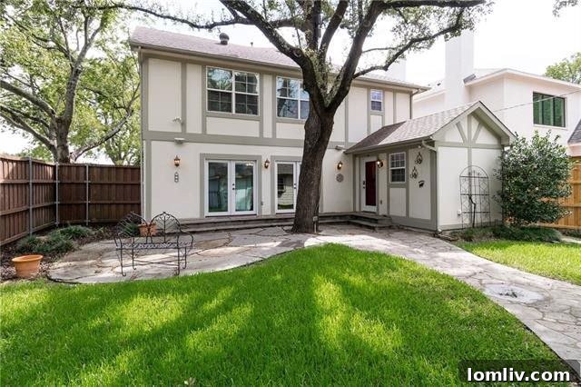 Well-appointed master bathroom with dual vanity in a Devonshire property