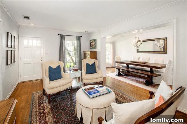 Cozy living room with hardwood floors and natural light in a Briarwood home