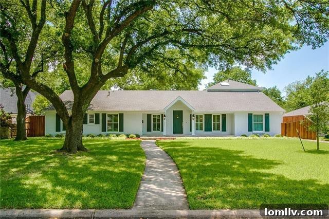 Elegant living area with rich woodwork in a Dallas Hockaday home