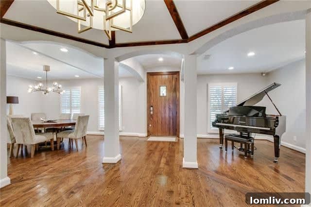 Spacious gourmet kitchen with island in a luxury Hockaday residence