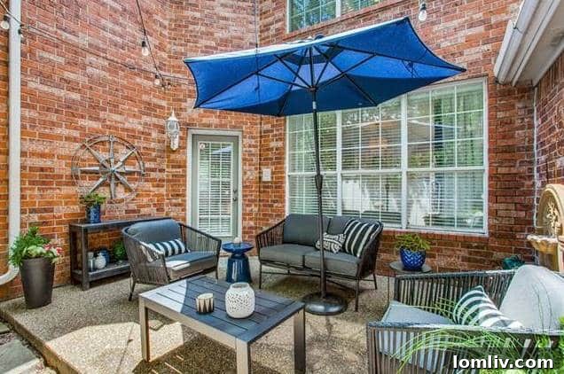 Charming backyard patio area, ideal for outdoor entertaining and relaxation