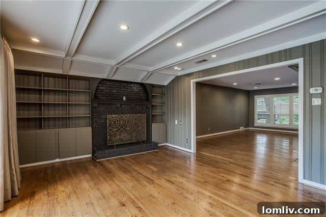 Inviting Living Room with Exposed Beams and Fireplace