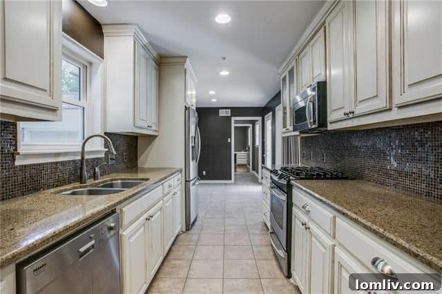 Modern Kitchen with Granite Countertops and Breakfast Nook