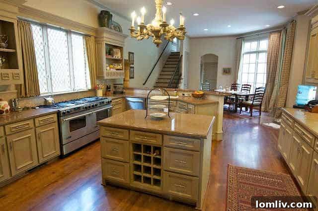 Kitchen of English Cotswold manor before structural renovation, showing enclosed space