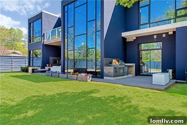 Modern kitchen with live edge wood finishes and exotic stone counters in the Devonshire home.