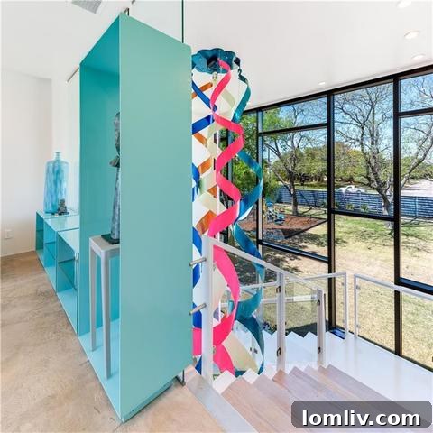 Close-up of the custom ribbon sculpture on the floating staircase, showcasing intricate details.