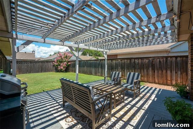 Backyard patio with pergola and spacious yard, The Colony starter home