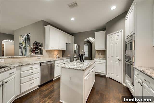 Modern kitchen with large island and ample counter space, The Colony