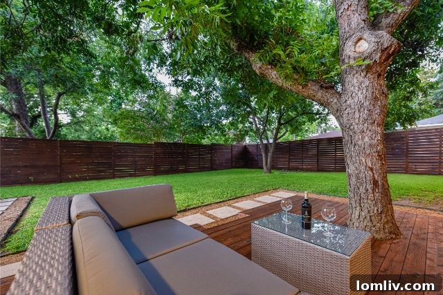 Lush, landscaped backyard with ample space for outdoor entertaining and relaxation
