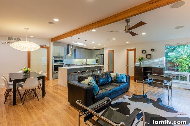 Stylish dining area in an open concept layout, ideal for entertaining