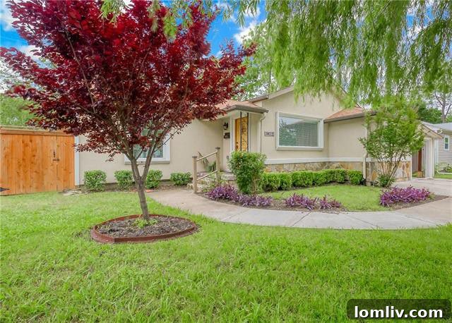 Midcentury Bungalow Exterior with Landscaped Yard