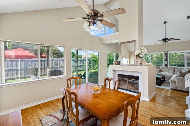 Spacious Backyard with Lush Landscaping and Park Views