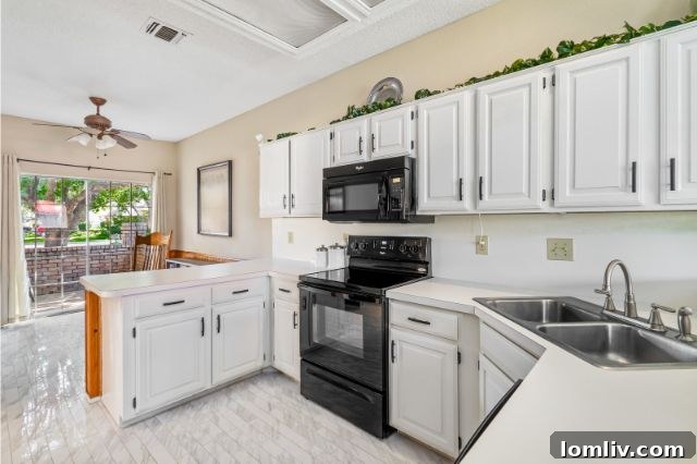 Tastefully Updated Kitchen with Modern Tile and Natural Light