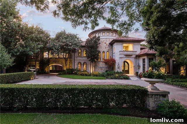 Experience unparalleled luxury at 5019 Shadywood Lane, a Tuscan Mediterranean masterpiece in Dallas's prestigious Bluffview neighborhood. This estate offers resort-style amenities on a lush one-acre lot, providing an exquisite blend of sophistication and comfort.