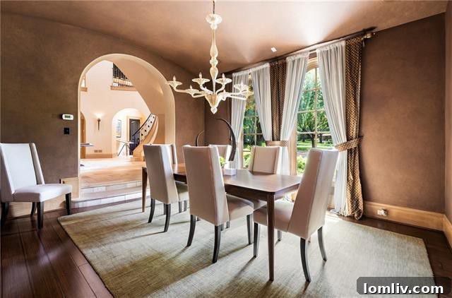 The luxurious interior of 5019 Shadywood Lane, revealing sophisticated design and seamless integration with the scenic views of Bluffview. This Dallas smart home offers elegance and modern convenience.