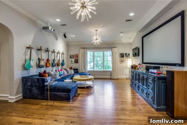 Luxurious master bedroom suite with a sitting area and large windows overlooking the grounds