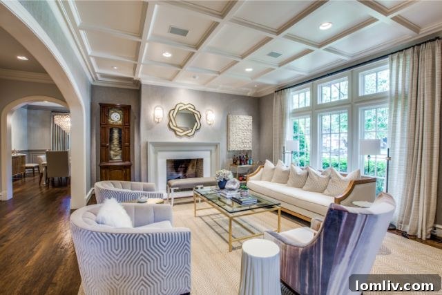 Elegant living room with fireplace and designer furniture in a Dallas luxury residence