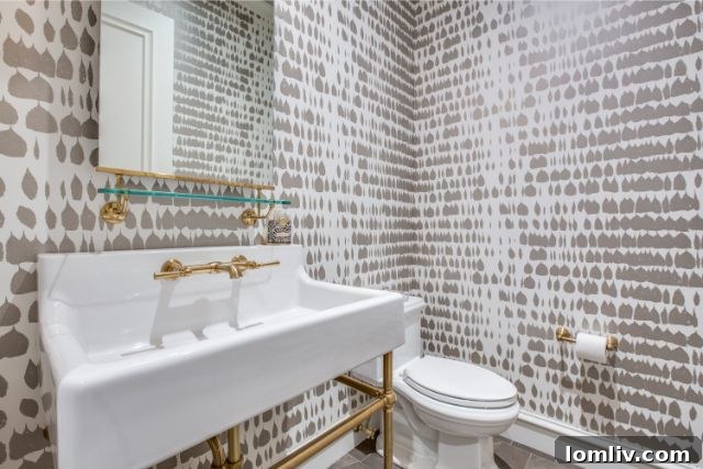 Modern, spacious kitchen with high-end appliances and island in a University Park luxury home