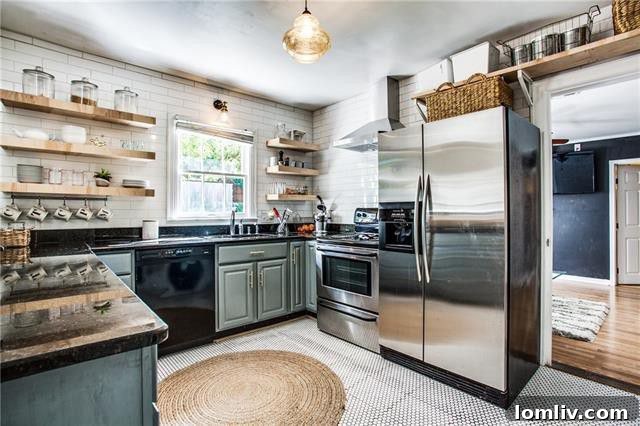 Modern Kitchen with Subway Tile and Muted Green Cabinetry in Dallas Home