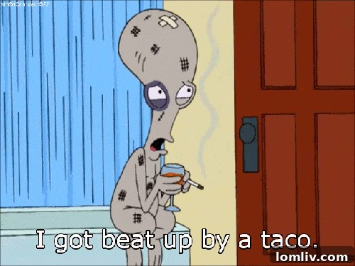 A creatively designed hotel room reflecting the Taco Bell brand aesthetic.