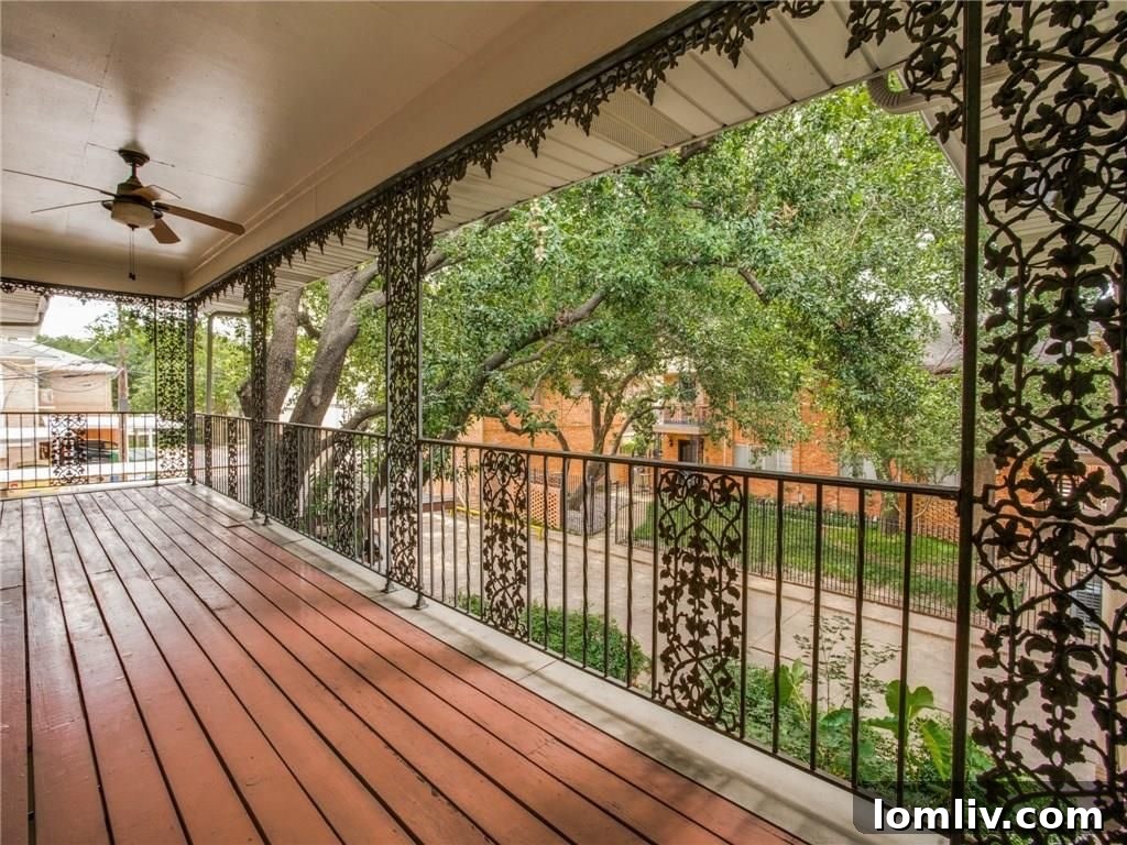 Discover 13 Exclusive Homes Behind The Pink Wall This Sunday 8 Peaceful patio view with wrought iron detailing at 8604 Baltimore Dr. Unit 4