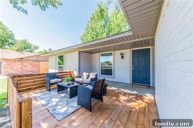 Front porch with wooden patio and privacy fence at 109 Kenshire Drive