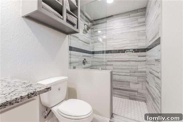 Master bathroom with doorless shower and custom vanity