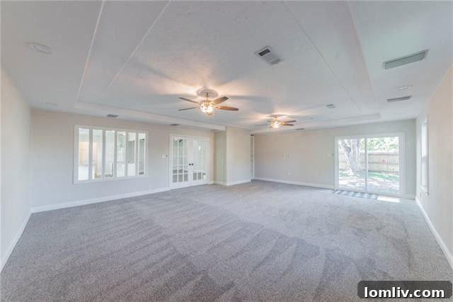 Bedroom with built-in bookcases at 109 Kenshire Drive