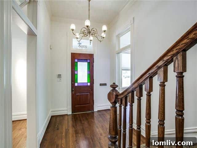 Grand entrance and architectural details of a 1896 Queen Anne home