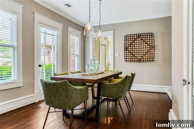 Elegant living room with fireplace and hardwood floors in the Craftsman home