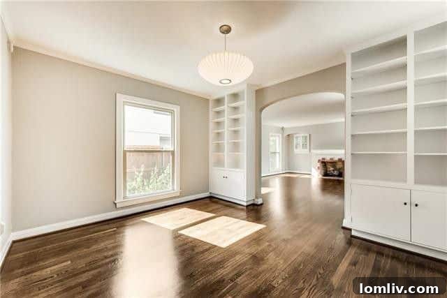 Inviting living room with polished hardwood floors in the cottage