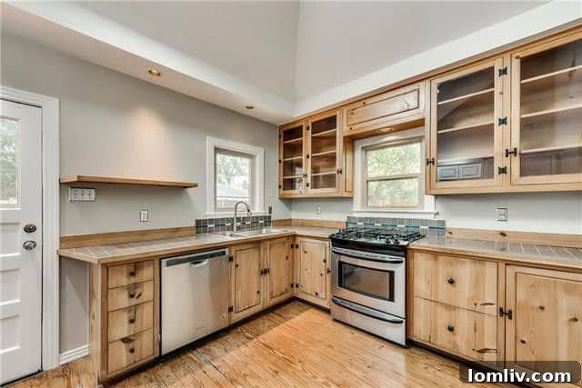 Modern kitchen with fresh paint and functional layout in the cottage