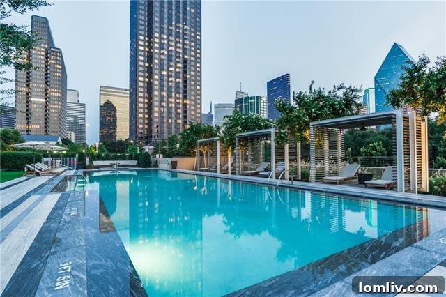 Museum Tower 36th-Floor Unit with Breathtaking Views For Lease 7 Museum Tower Dallas outdoor pool and lounge area with city backdrop