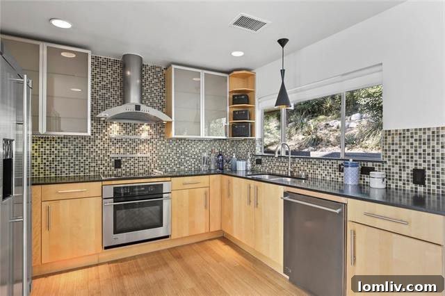 Sleek modern kitchen with high-end appliances and island