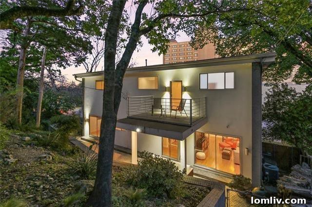 Modern bedroom with city views and elegant design