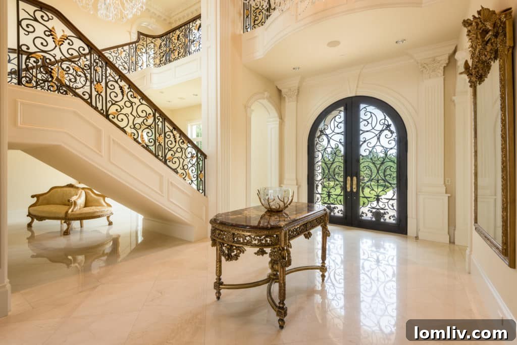 Grand Entrance of Chateau Lumier: 26-foot Tall Entry with Marble Floating Staircase