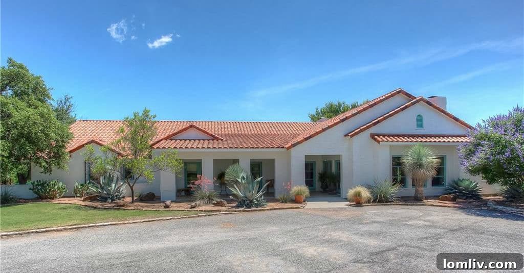 Aerial view of the renovated ranch home at Running Horse Ranch