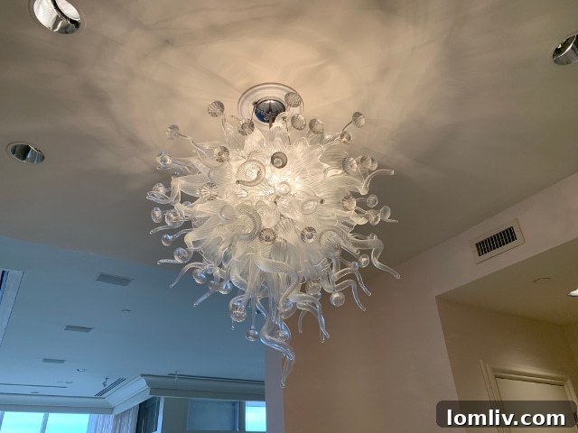Zenith Zing Reclaimed Revelry 2 Elegant white and clear glass chandelier, resembling Chihuly style, for sale