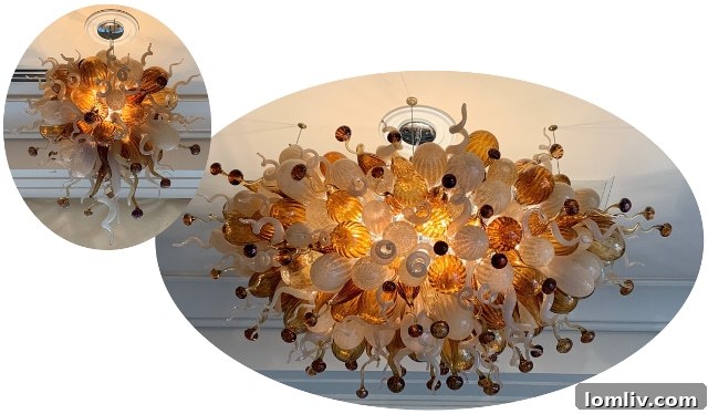 Zenith Zing Reclaimed Revelry 4 Two brown, tan, and beige glass chandeliers from the office space