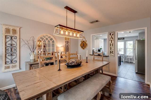 Cozy living room with exposed beams and fireplace in a Cedar Hill farmhouse