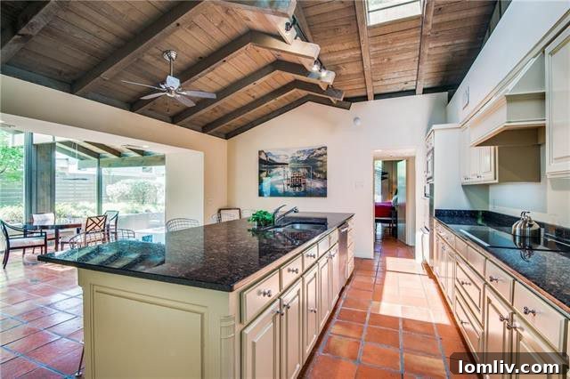 Cozy living area with a fireplace and views of the garden