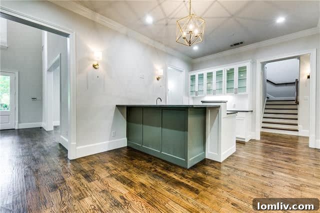 Gourmet kitchen with SubZero-Wolf appliances and Italian Carrara quartz countertops