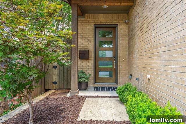 Sleek, bright modern kitchen with quartz countertops, Dacor appliances, and ample storage