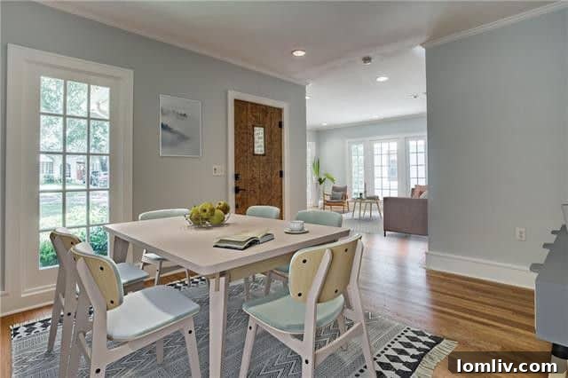 Inviting living room with a traditional gas fireplace and gleaming hardwood floors